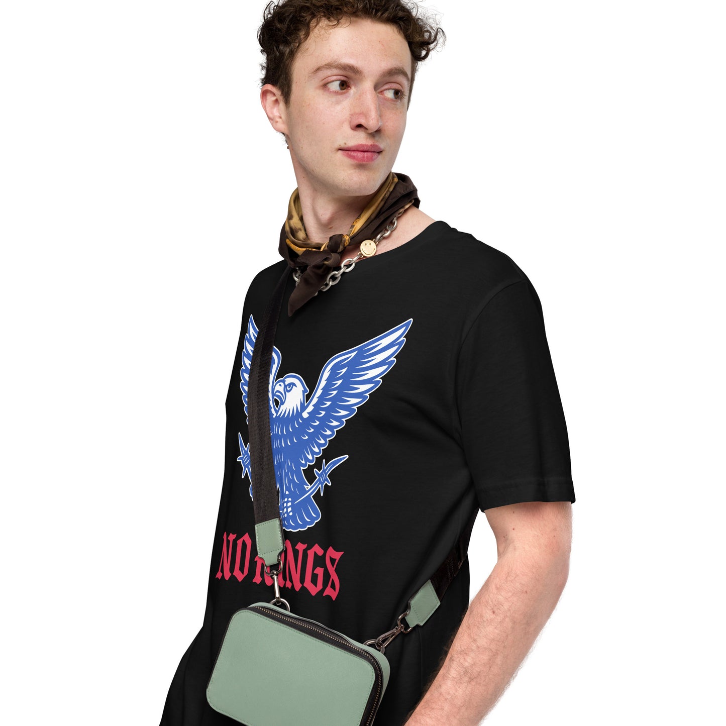 Male protester wearing the "No Kings In America" Anti-Trump Patriotic Eagle Graphic Unisex T-Shirt