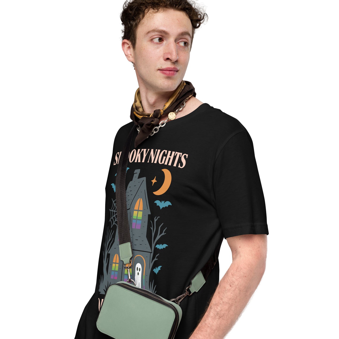 Model wearing black “Spooky Nights Equal Rights” progressive Halloween pride t-shirt with haunted house and ghost design.