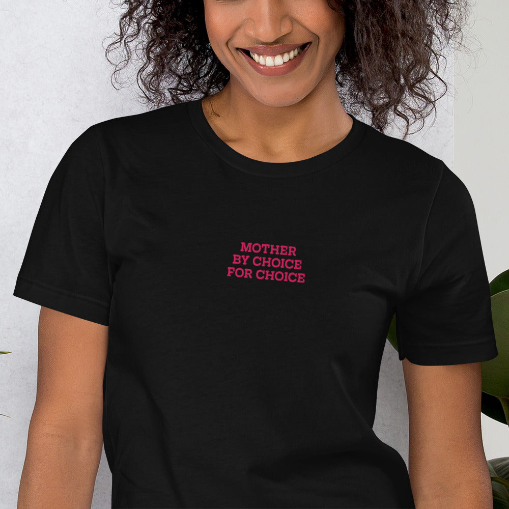 Black woman wearing the "Mother By Choice For Choice" Pro-Choice Embroidered Unisex T-Shirt
