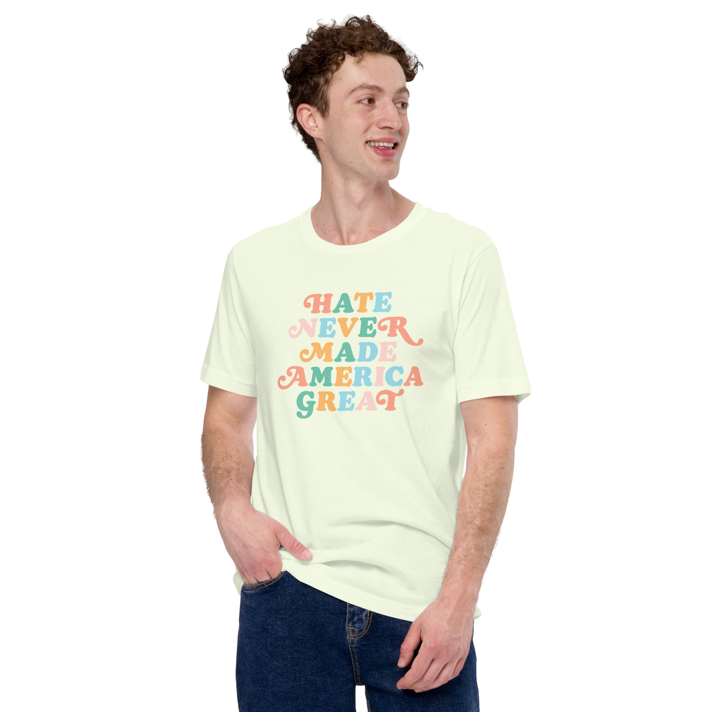 Model wearing cream “Hate Never Made America Great” unisex t-shirt styled with jeans.