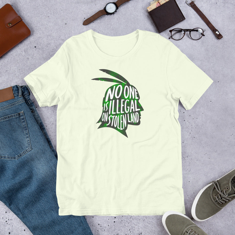Flat lay image of the No One Is Illegal On Stolen Land Graphic Unisex Tee