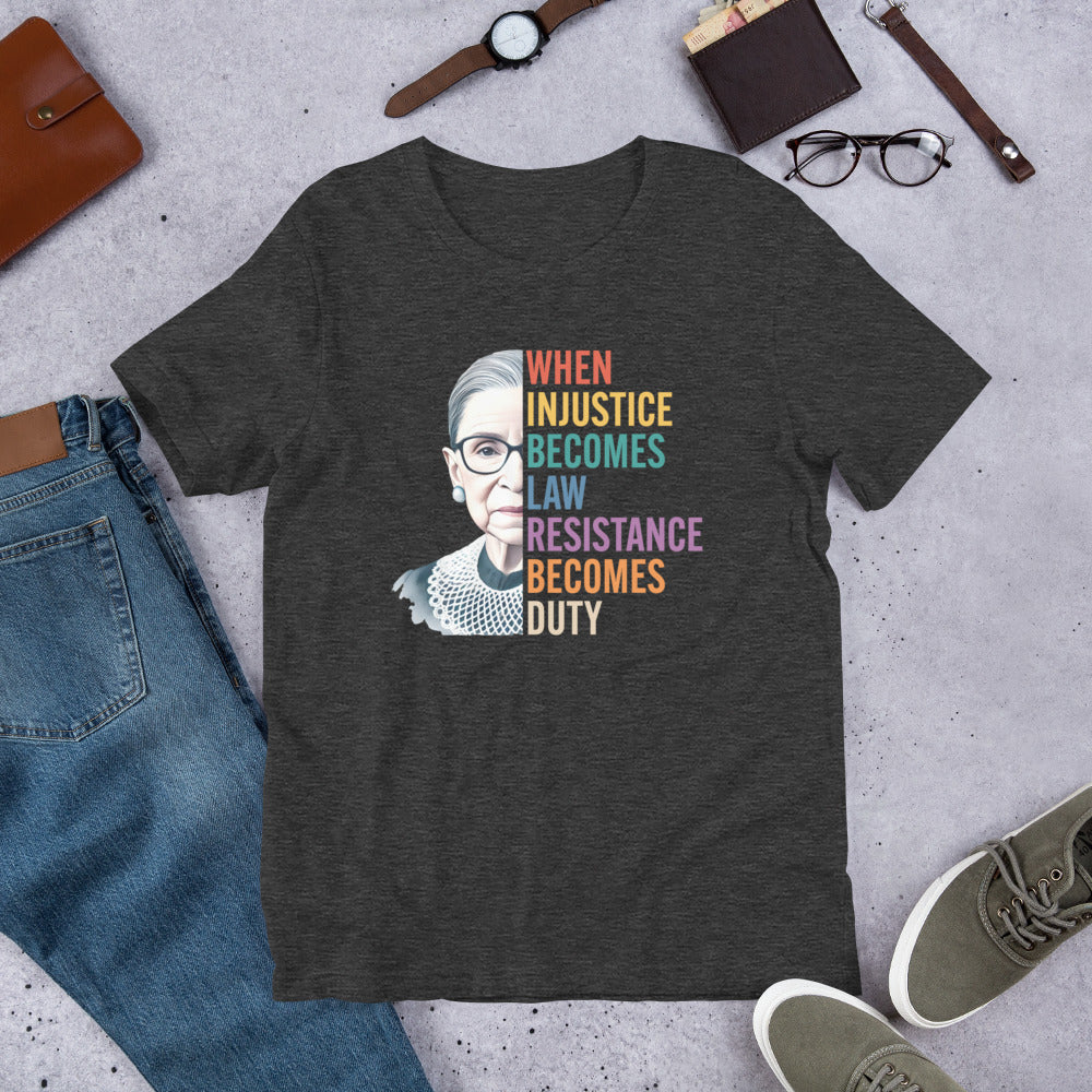 Flat Lay Image: Unisex t-shirt with Ruth Bader Ginsburg design and text neatly displayed.