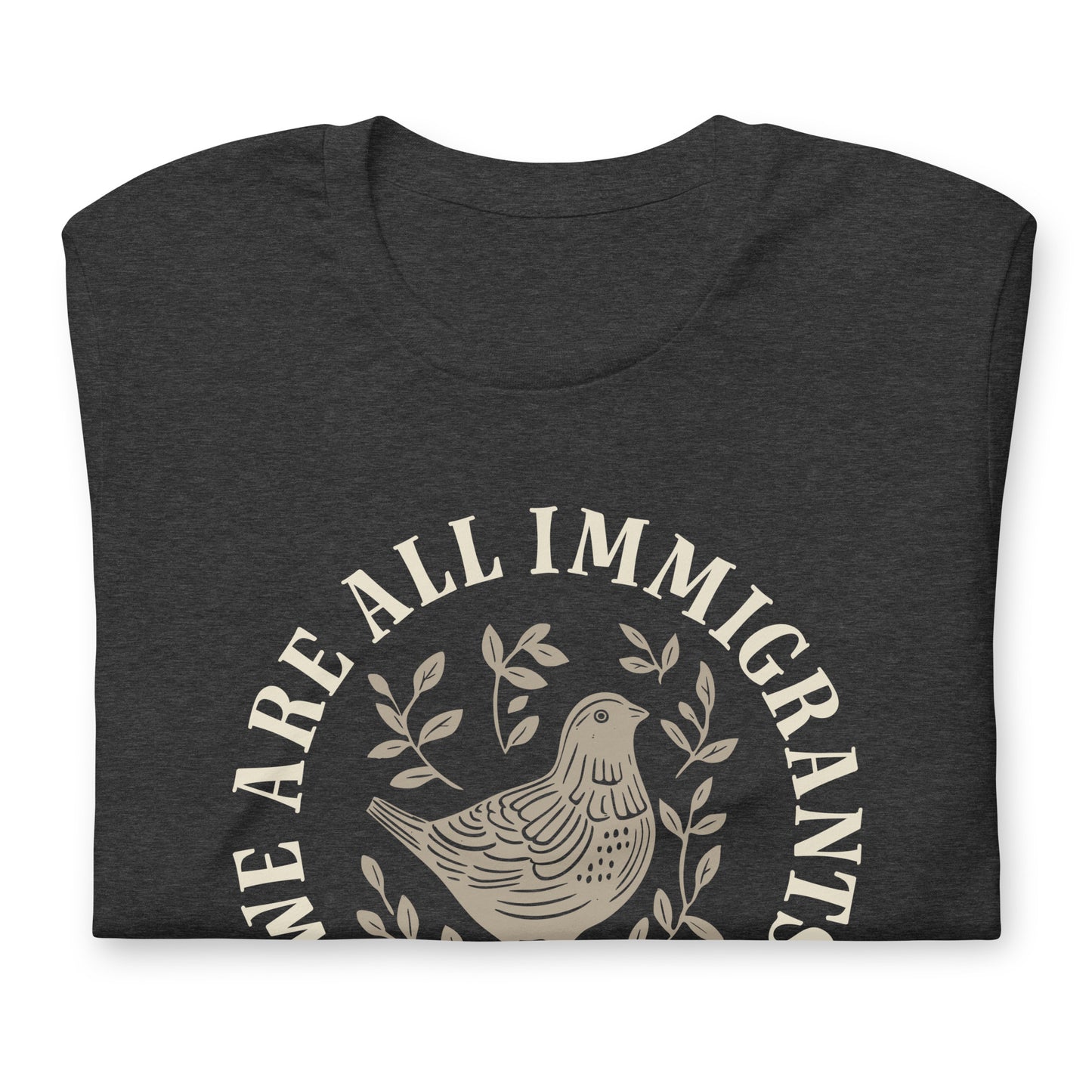Close-up of linocut dove and leaves design with 'We Are All Immigrants' phrase.