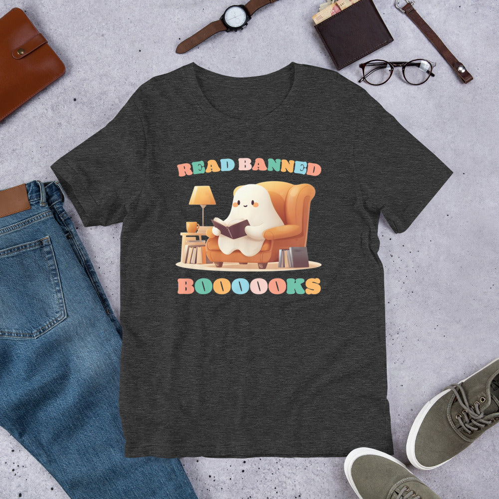 Flat lay view of the "Read Banned Boooooks" Bookish Halloween T-Shirt featuring a cute ghost reading books.
