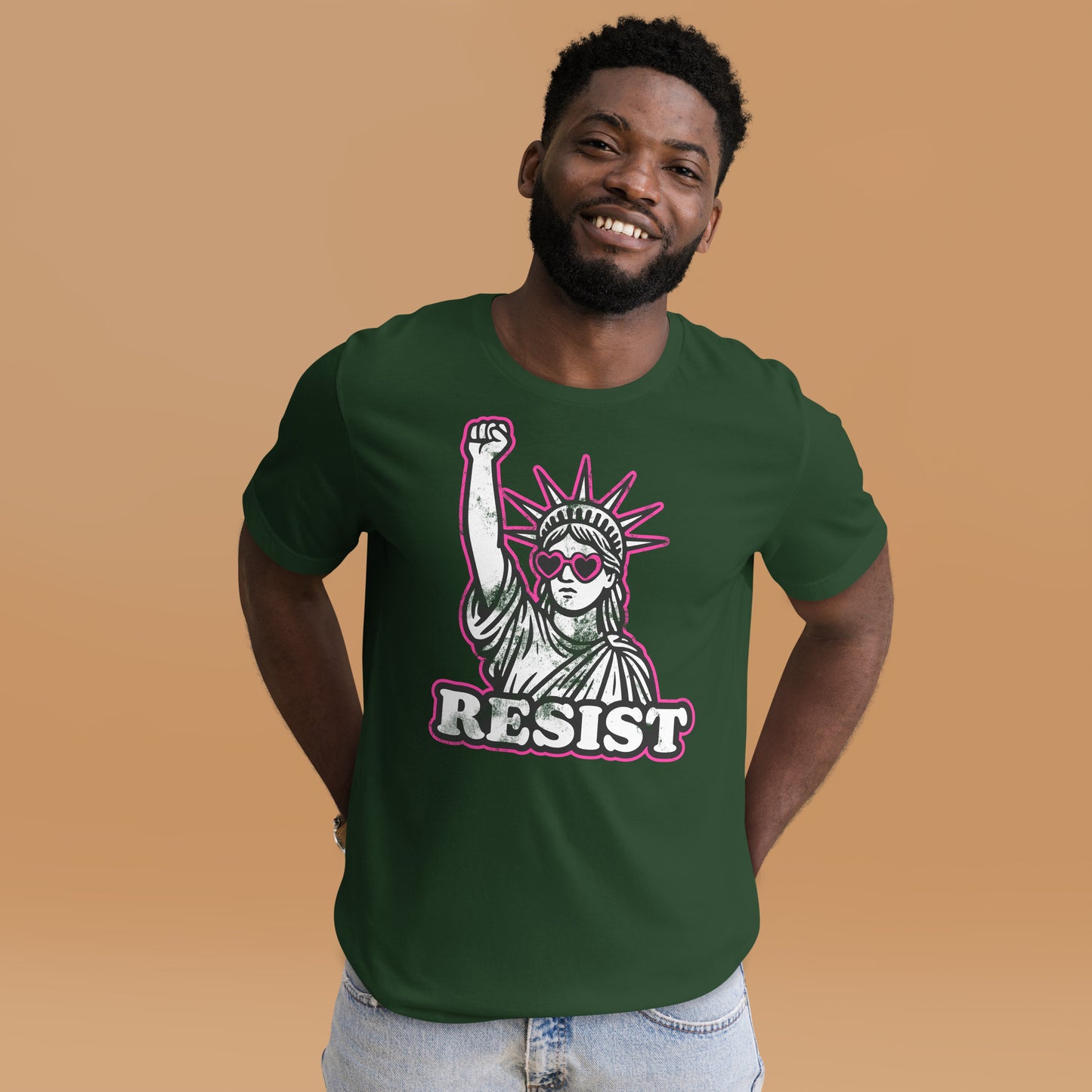 Lifestyle Image: Model protester wearing the RESIST feminist t-shirt with raised fist Statue of Liberty and pink heart sunglasses - forest green