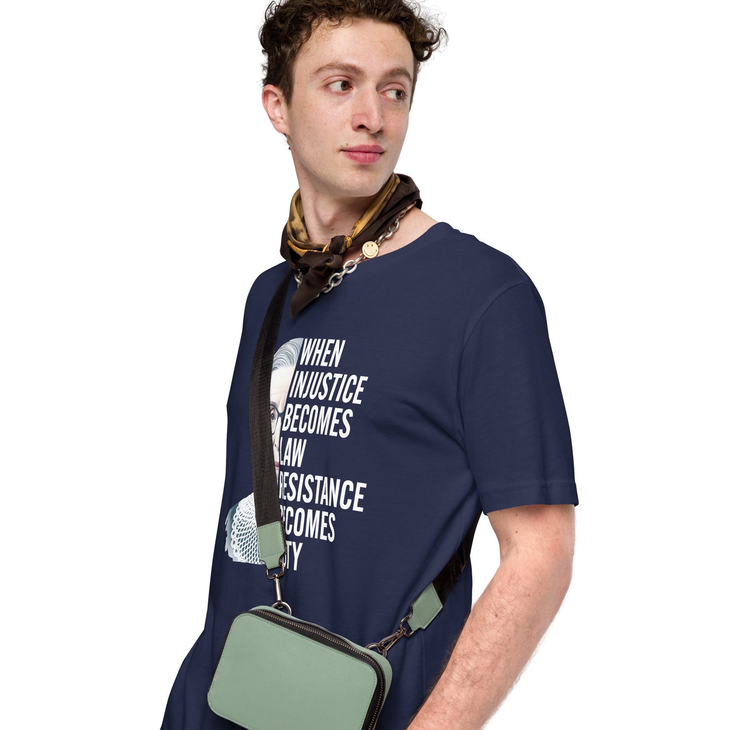 Model wearing the unisex t-shirt with Ruth Bader Ginsburg’s portrait and the phrase “Resistance Becomes Duty.”