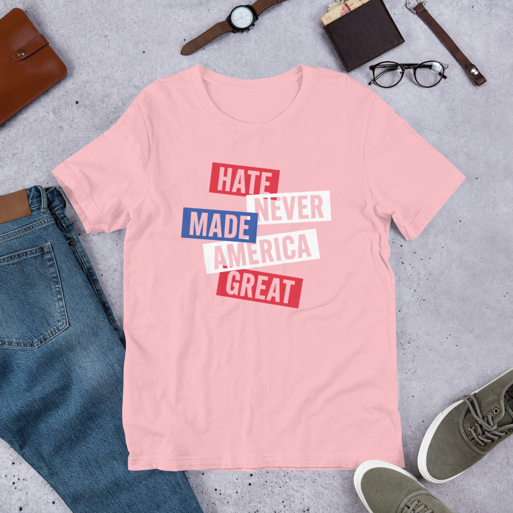 Flat lay of the Hate Never Made America Great T-shirt, styled with casual accessories for a modern look.