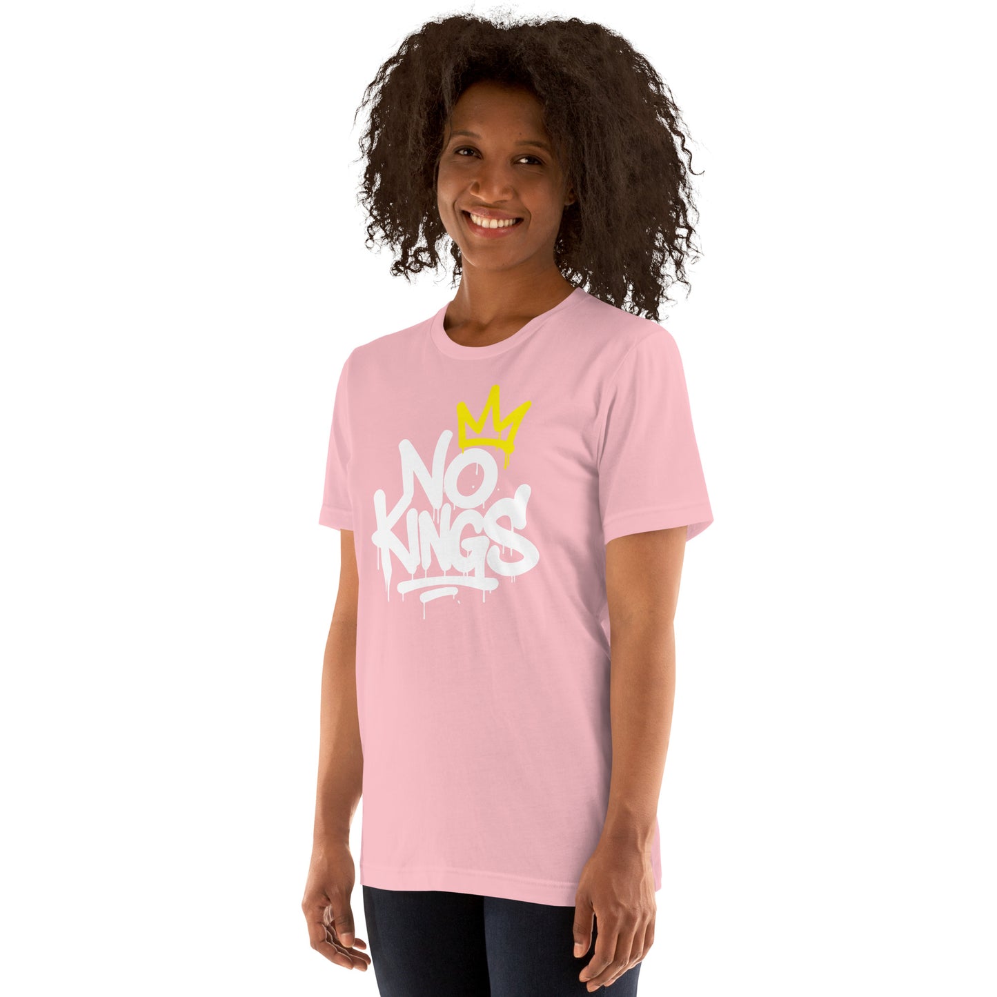 Lifestyle Image: Female Model wearing graffiti-style No Kings in America unisex t-shirt with anti-authoritarian message