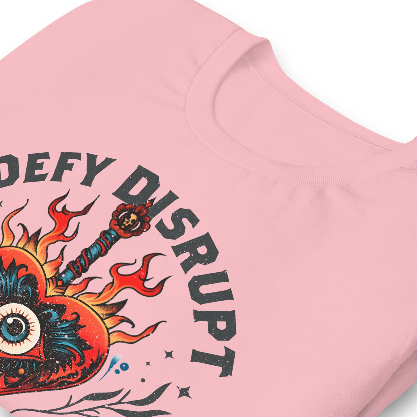 Close-up of fiery heart graphic with eyeball, dagger, and bold anti-capitalist text.