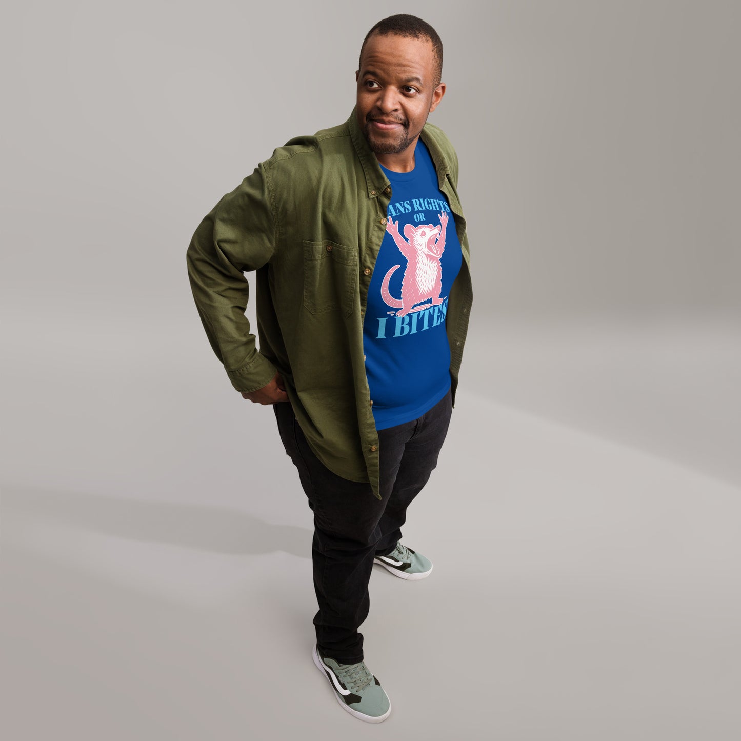 Black male activist wearing the "Trans Rights Or I Bites" Opossum Trans LGBTQ+ Protest Unisex T-Shirt