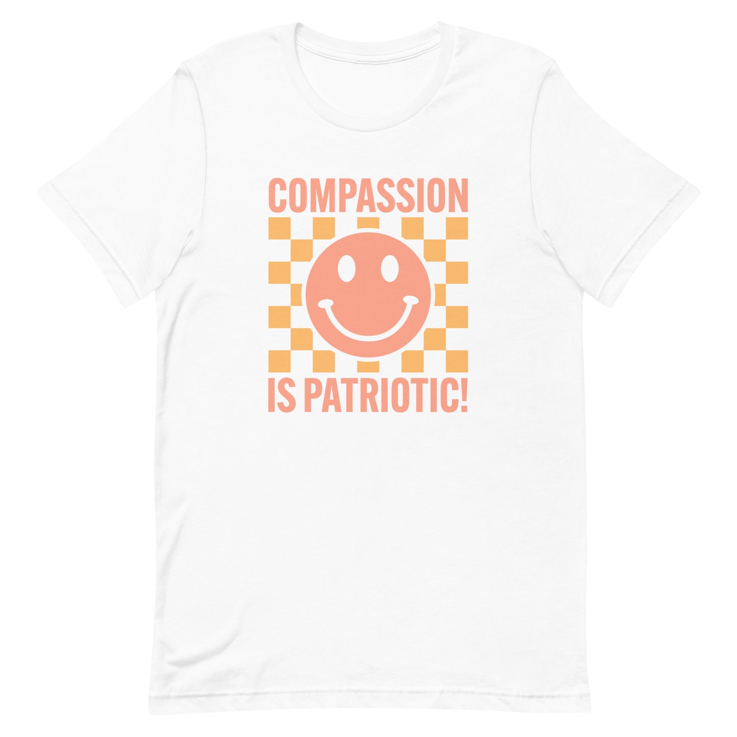 Front view of the Compassion Is Patriotic Smiley Face Unisex T-Shirt featuring a cheerful smiley design and bold text.