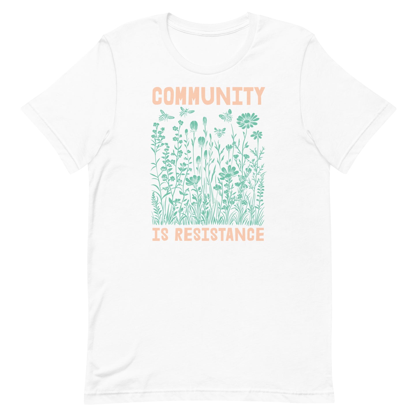 White Community Is Resistance t-shirt featuring pale green floral illustration and peach text. Clean, airy, and expressive of hope, compassion, and change.