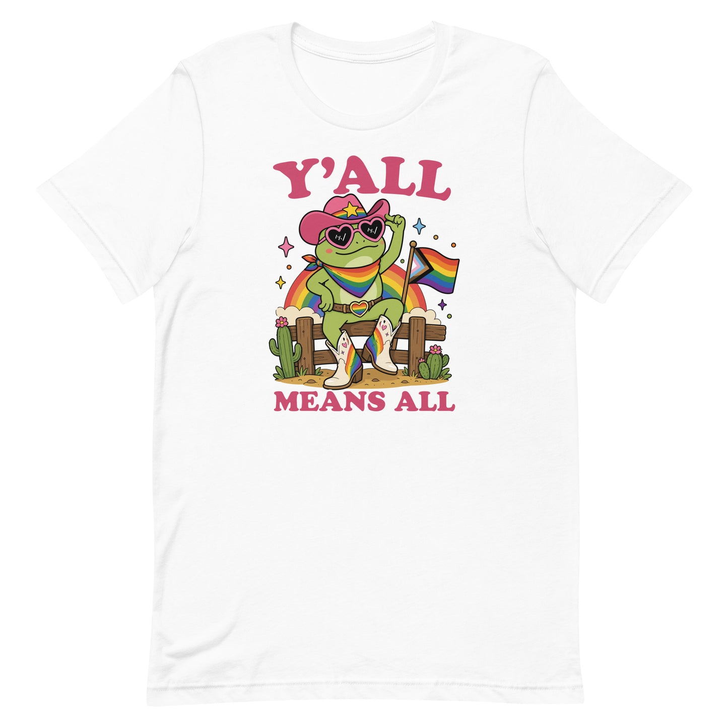 White pride t-shirt showcasing rainbow cowboy frog artwork, pride flag details, and bold “Y’All Means All” message promoting inclusion, equality, and community.