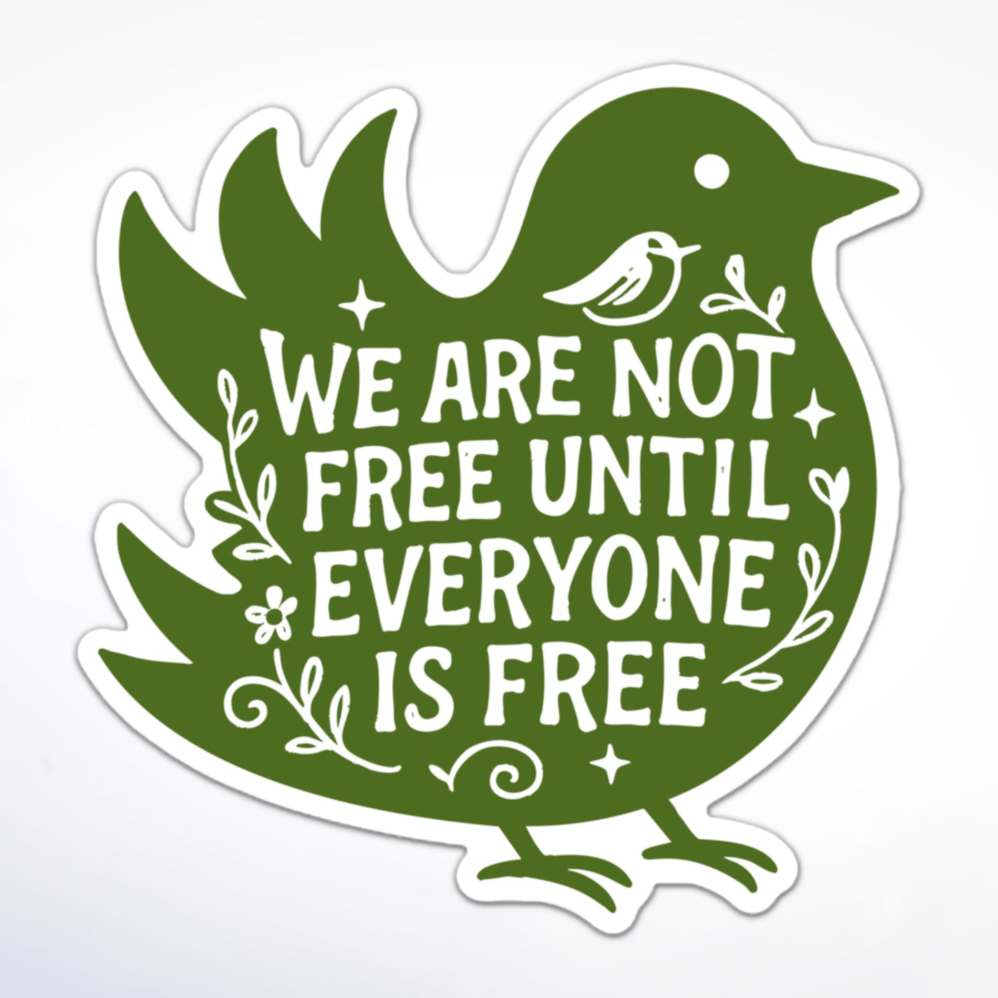 We Are Not Free Until Everyone Is Free sticker shaped like a bird with floral accents and hand-lettered text.