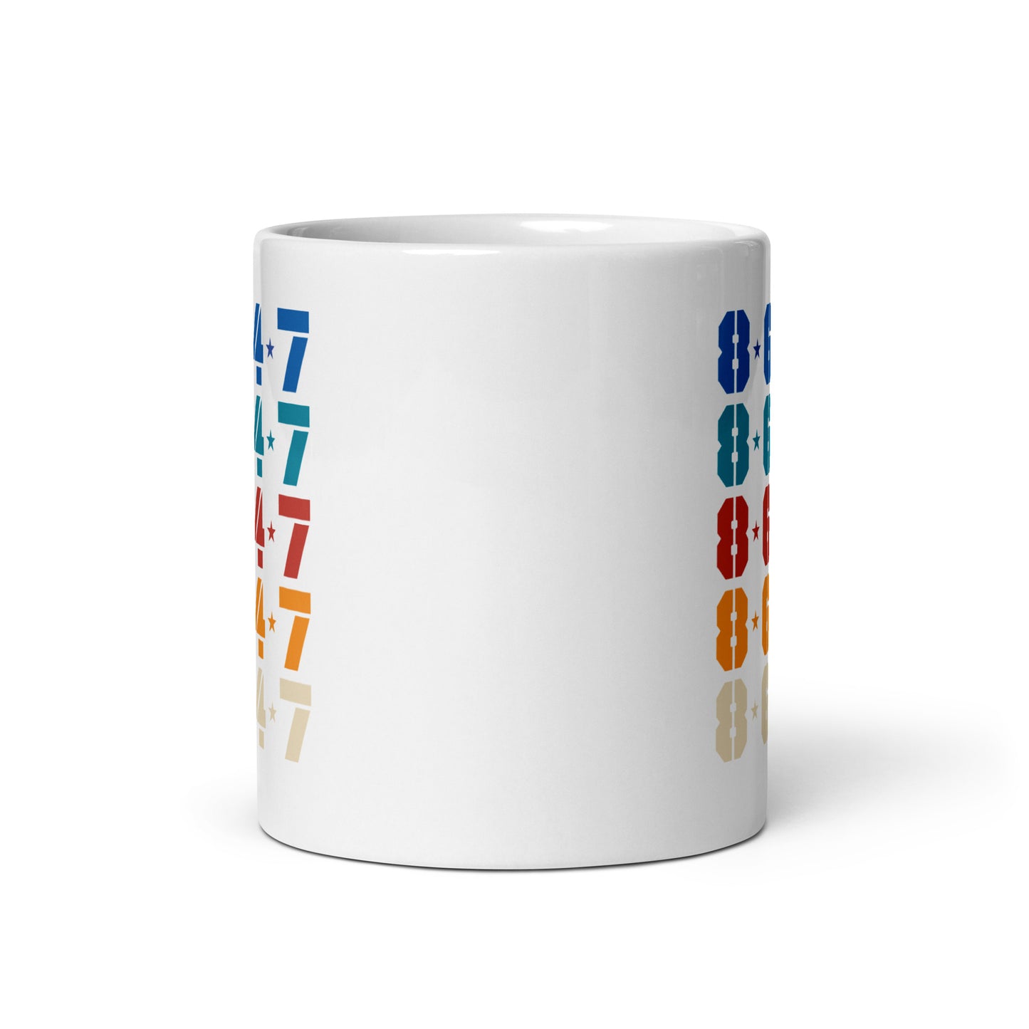 Side view of the 11 oz Subtle Anti-Trump 8647 FDT Retro Political Activism White Glossy Mug showcasing the "8647" design.