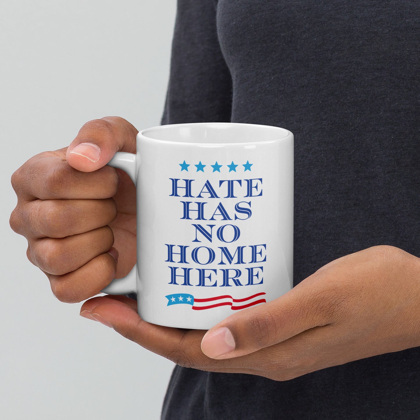 11 oz white mug featuring the Hate Has No Home Here slogan in bold text.