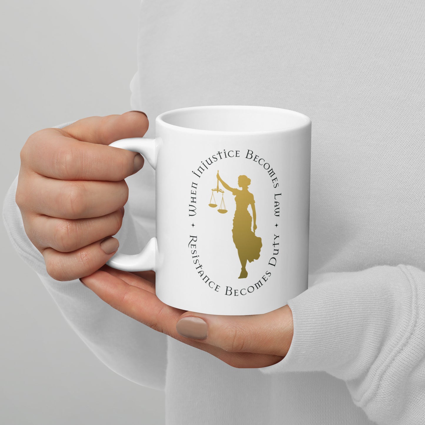 Front View Image: 11 oz white mug with Lady Justice holding scales and bold activist message.