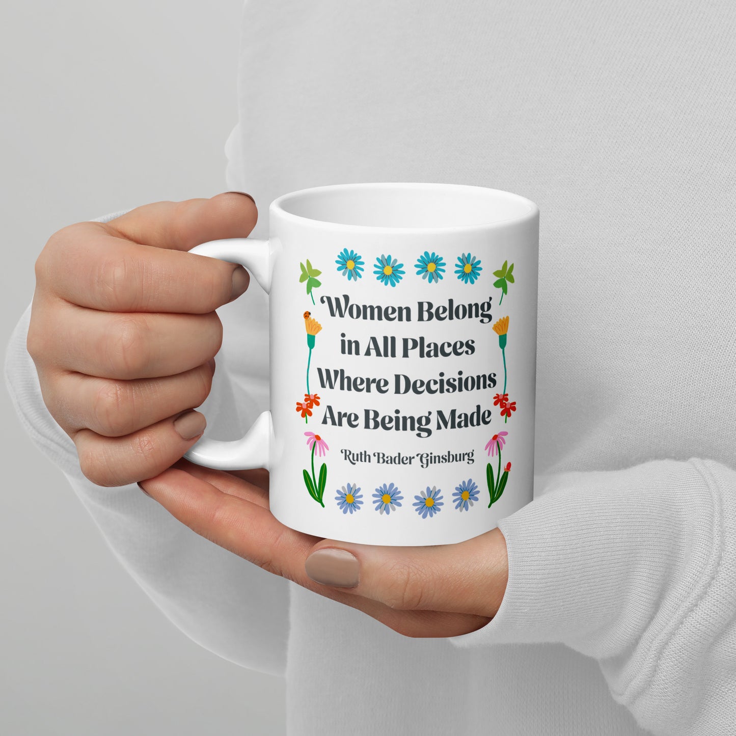 11 oz women Belong In All Places Where Decisions Are Being Made White Mug with floral design.