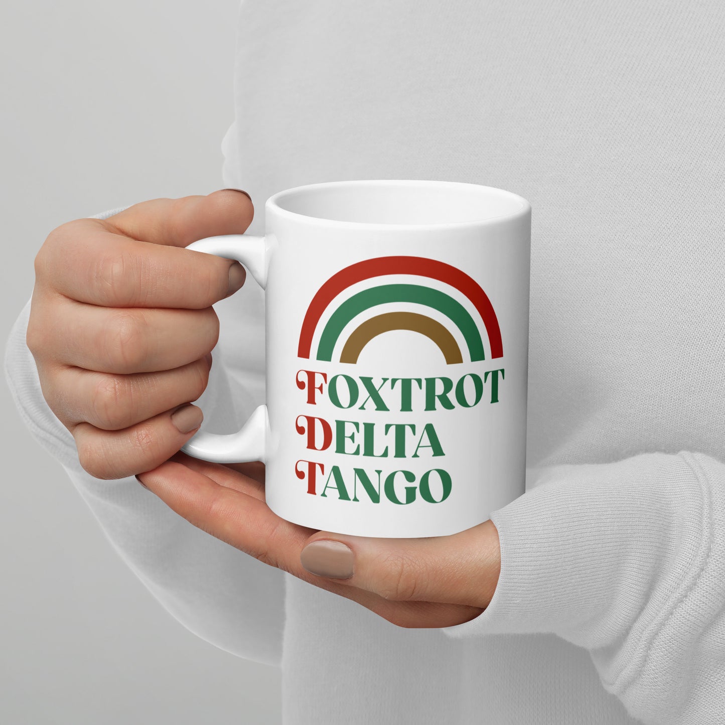 11 oz Foxtrot Delta Tango Anti-Trump Christmas Mug with festive rainbow design.