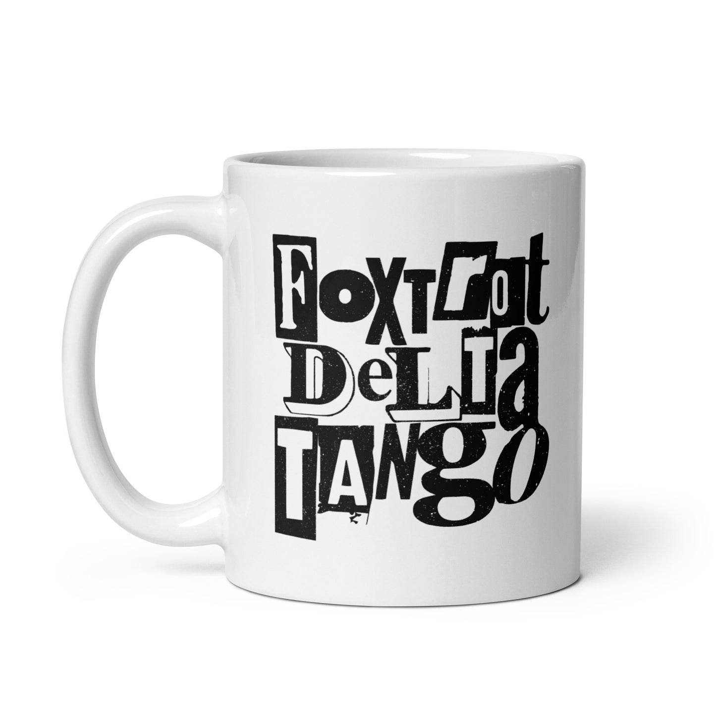 White 11 oz glossy mug featuring bold punk-inspired "Foxtrot Delta Tango" anti-MAGA design.