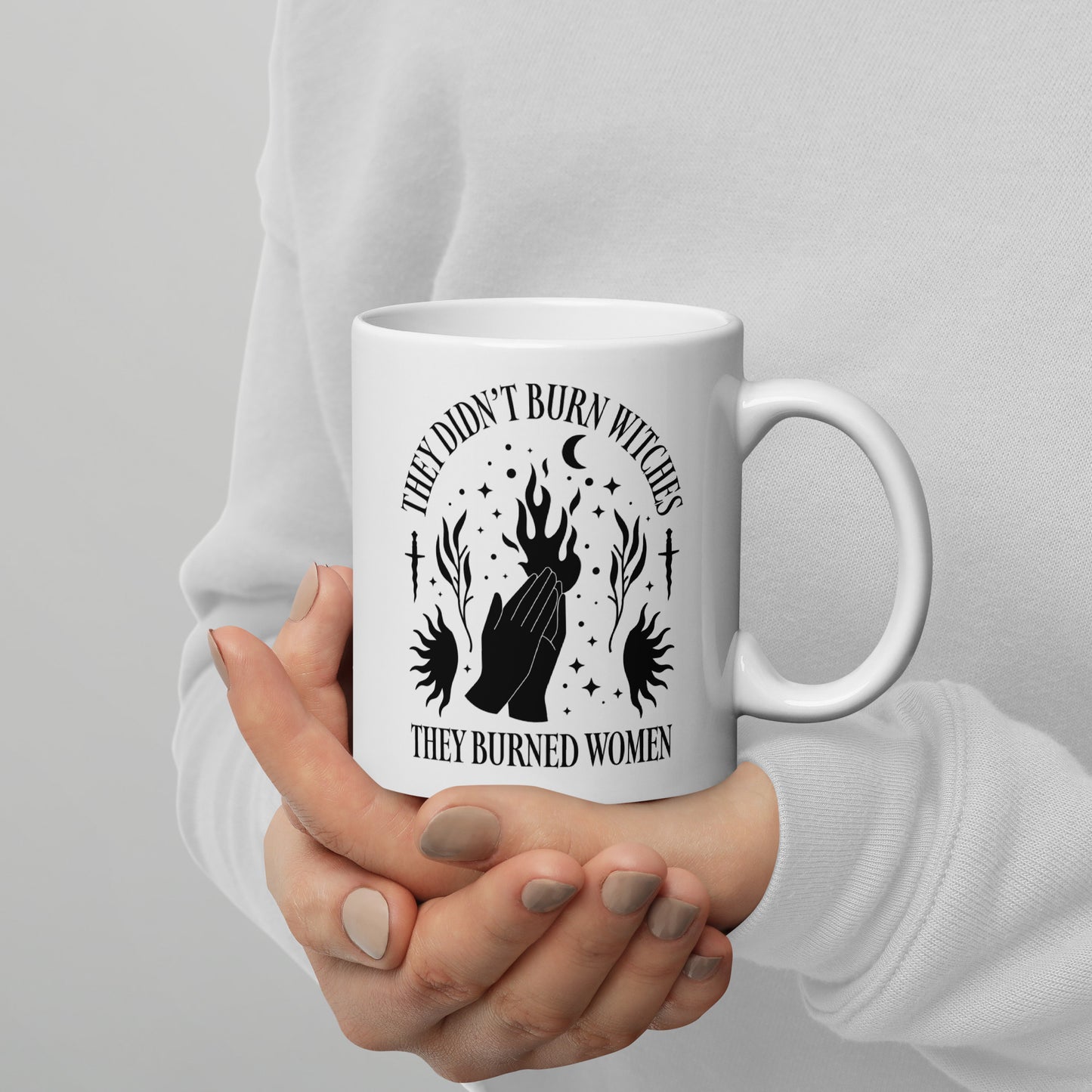 11 oz white mug featuring “They Didn’t Burn Witches They Burned Women” design.