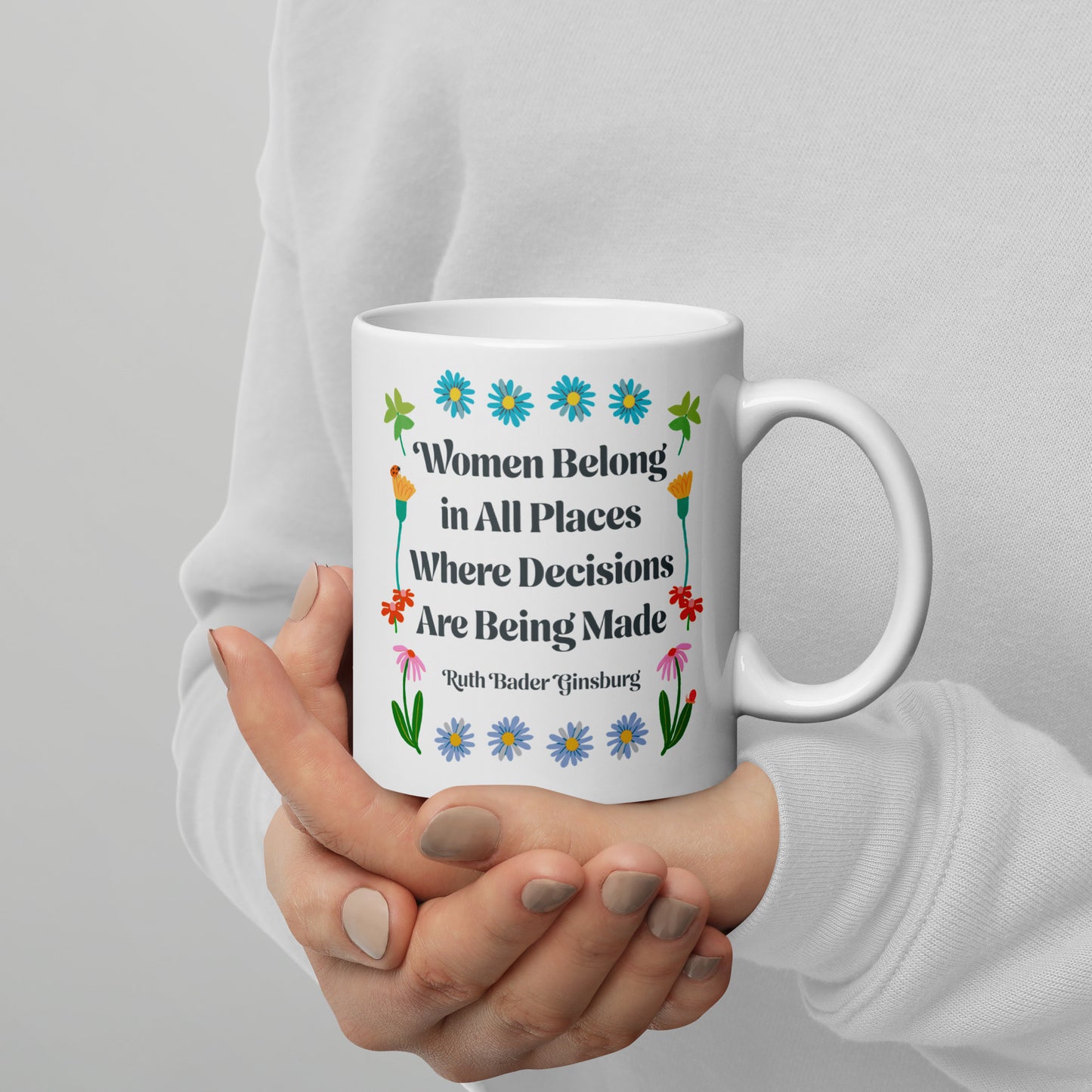 11 oz women Belong In All Places Where Decisions Are Being Made White Mug with floral design.