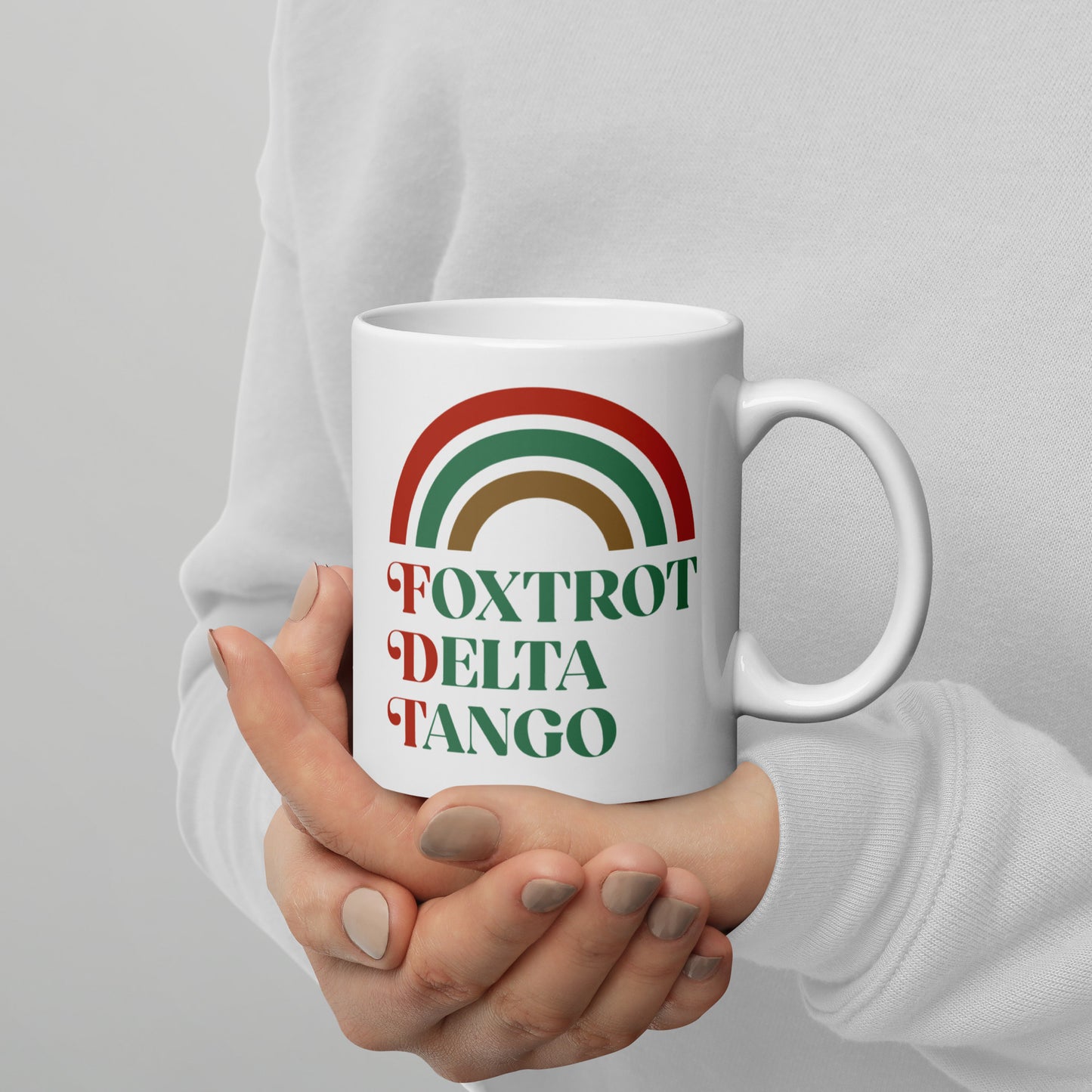11 oz Foxtrot Delta Tango Anti-Trump Christmas Mug with festive rainbow design.