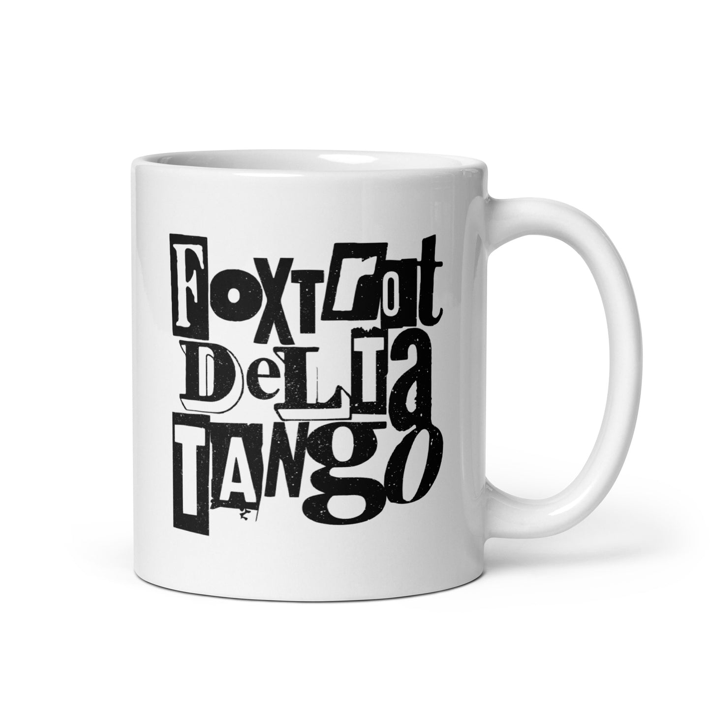 White 11 oz glossy mug featuring bold punk-inspired "Foxtrot Delta Tango" anti-MAGA design.