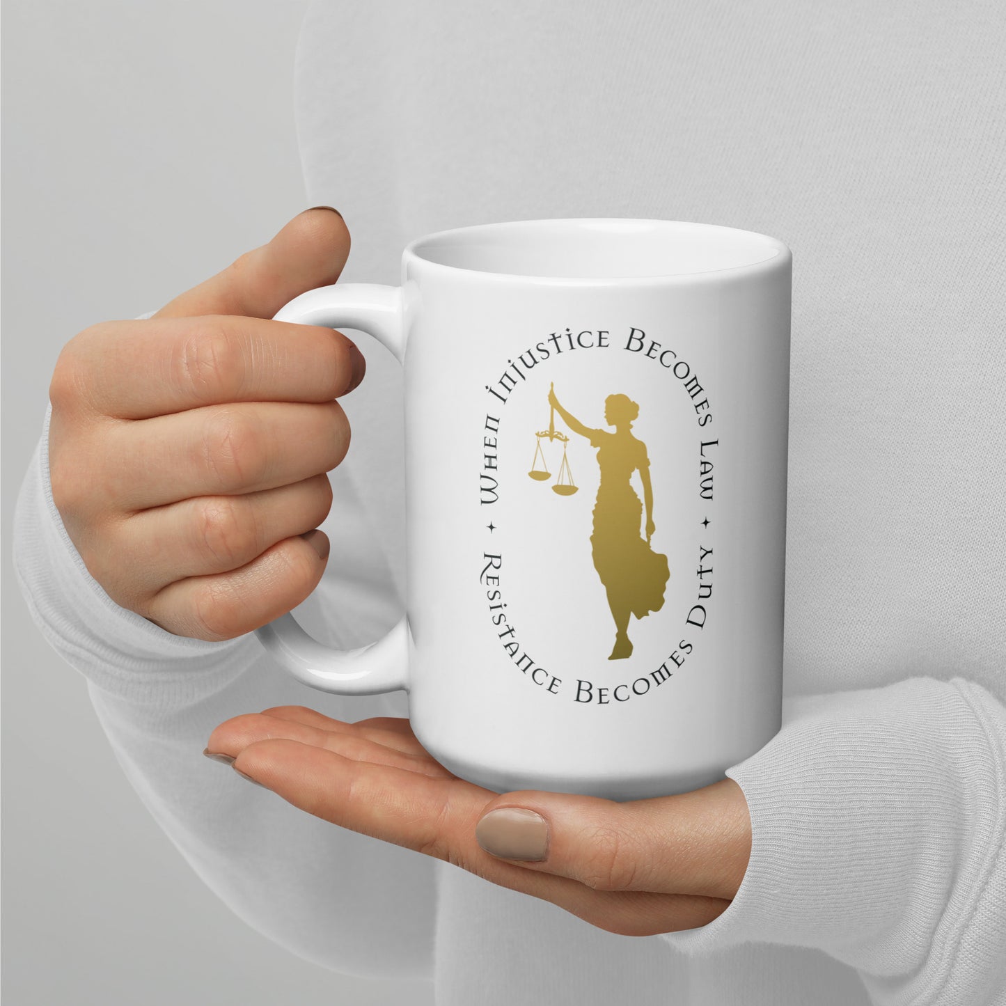 Front View Image: 15 oz white mug with Lady Justice holding scales and bold activist message.