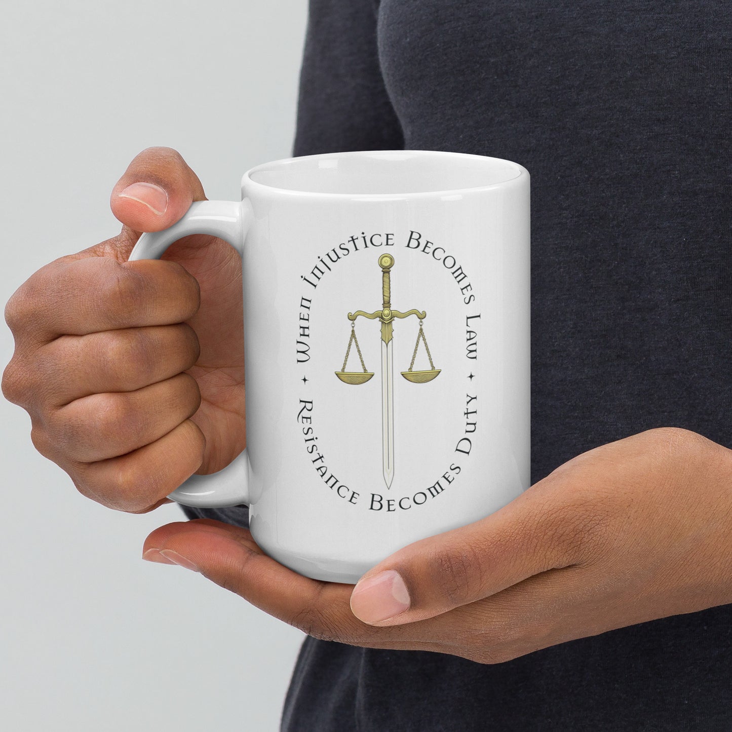 the 15 oz When Injustice Becomes Law Resistance Becomes Duty White Mug in hand during a morning coffee moment