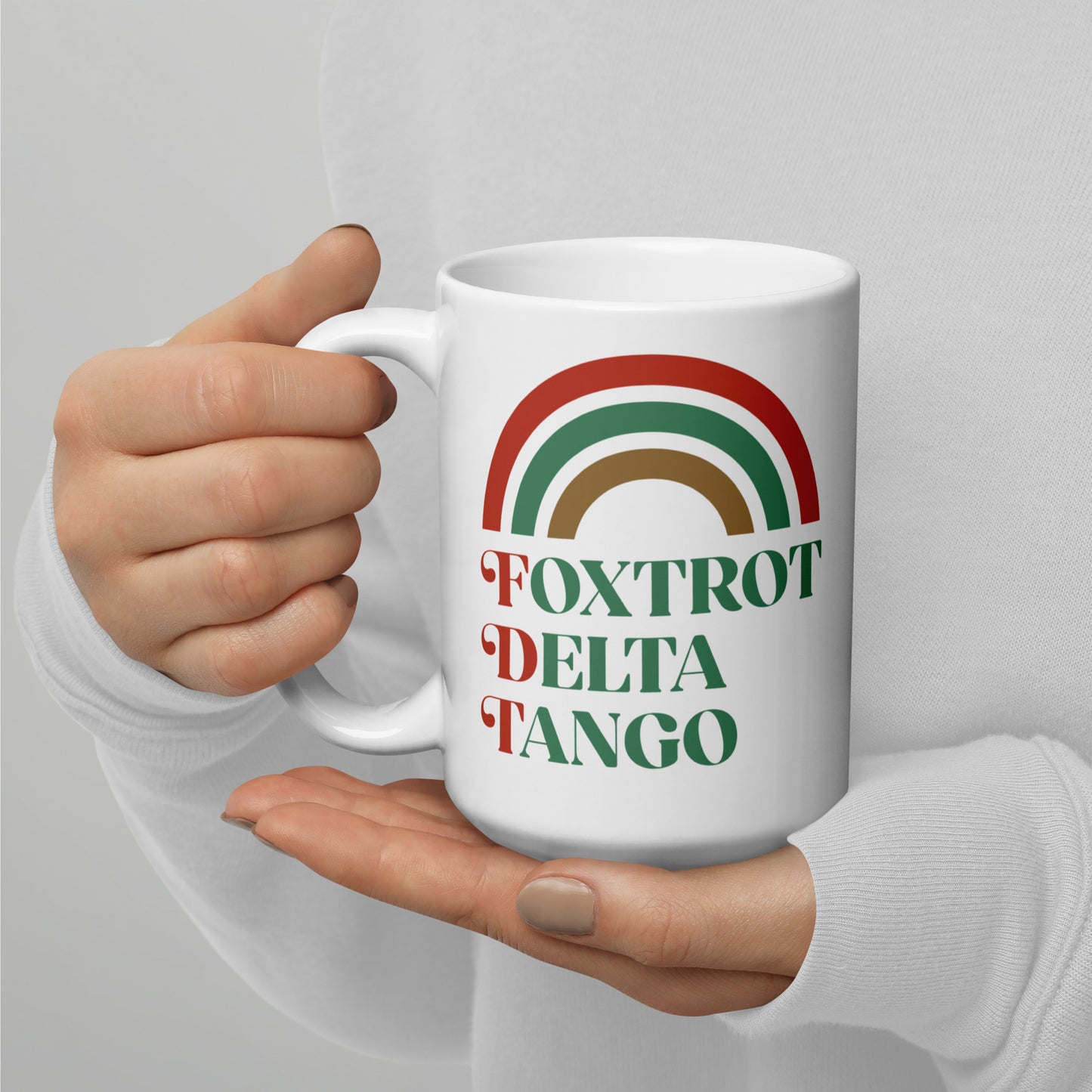 15 oz Foxtrot Delta Tango Anti-Trump Christmas Mug with festive rainbow design.