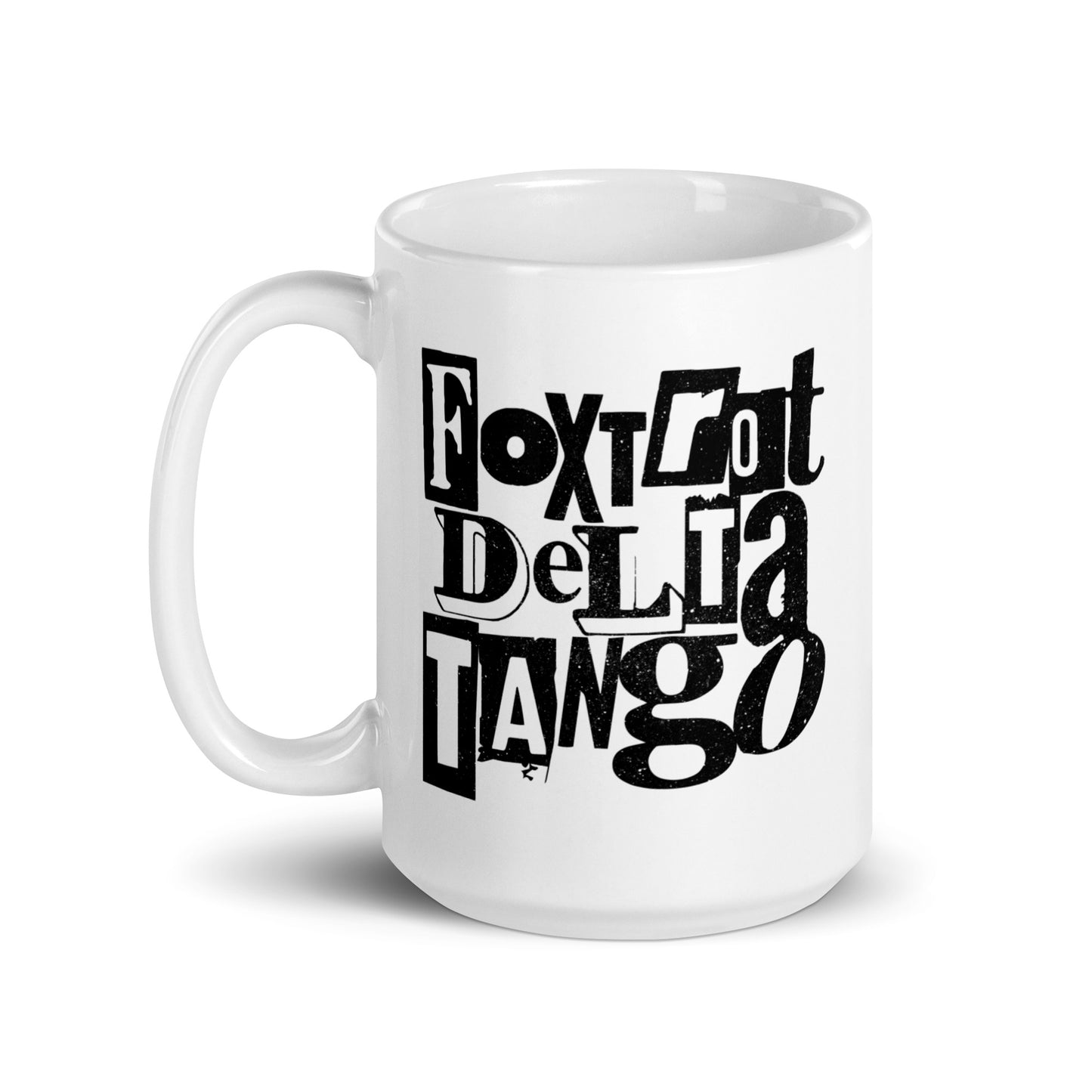 White 15 oz glossy mug featuring bold punk-inspired "Foxtrot Delta Tango" anti-MAGA design.