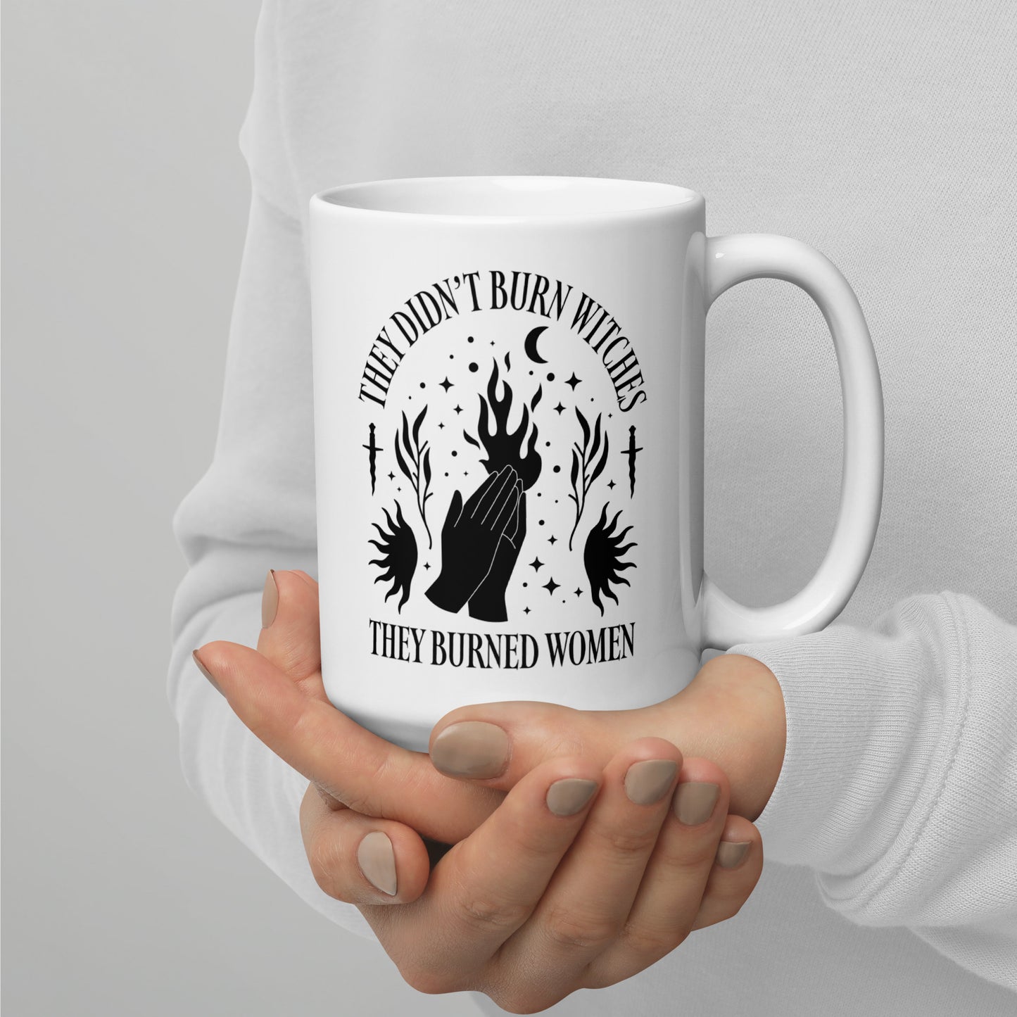 15 oz white mug featuring “They Didn’t Burn Witches They Burned Women” design.