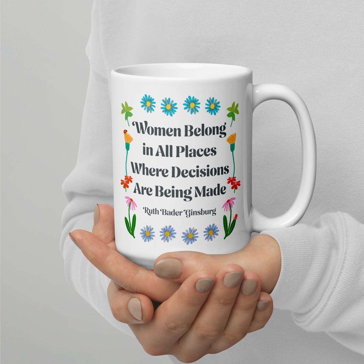 15 oz women Belong In All Places Where Decisions Are Being Made White Mug with floral design.
