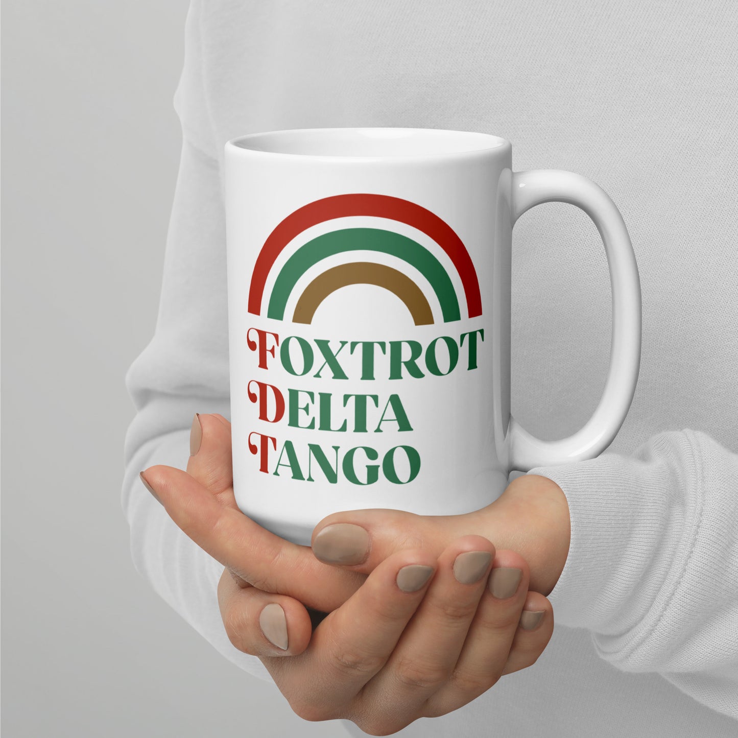 15 oz Foxtrot Delta Tango Anti-Trump Christmas Mug with festive rainbow design.