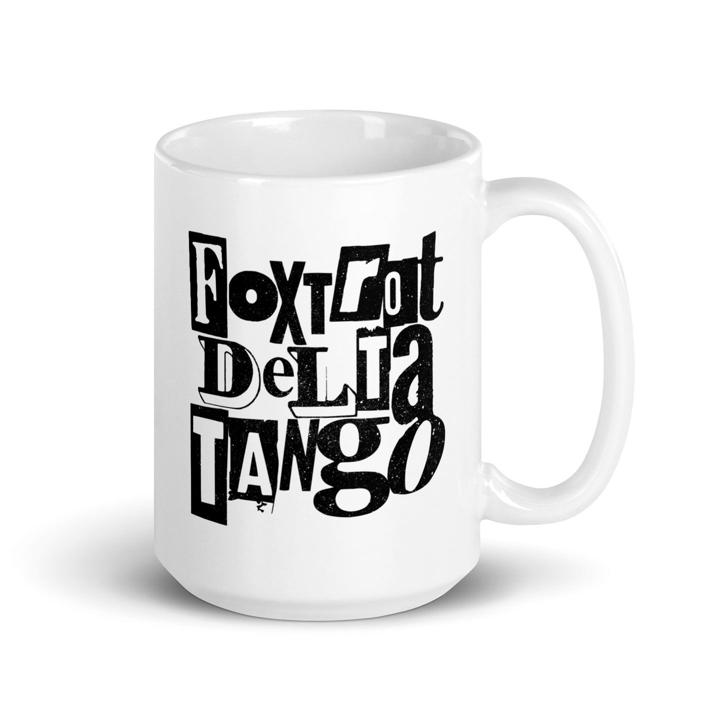 White 15 oz glossy mug featuring bold punk-inspired "Foxtrot Delta Tango" anti-MAGA design.