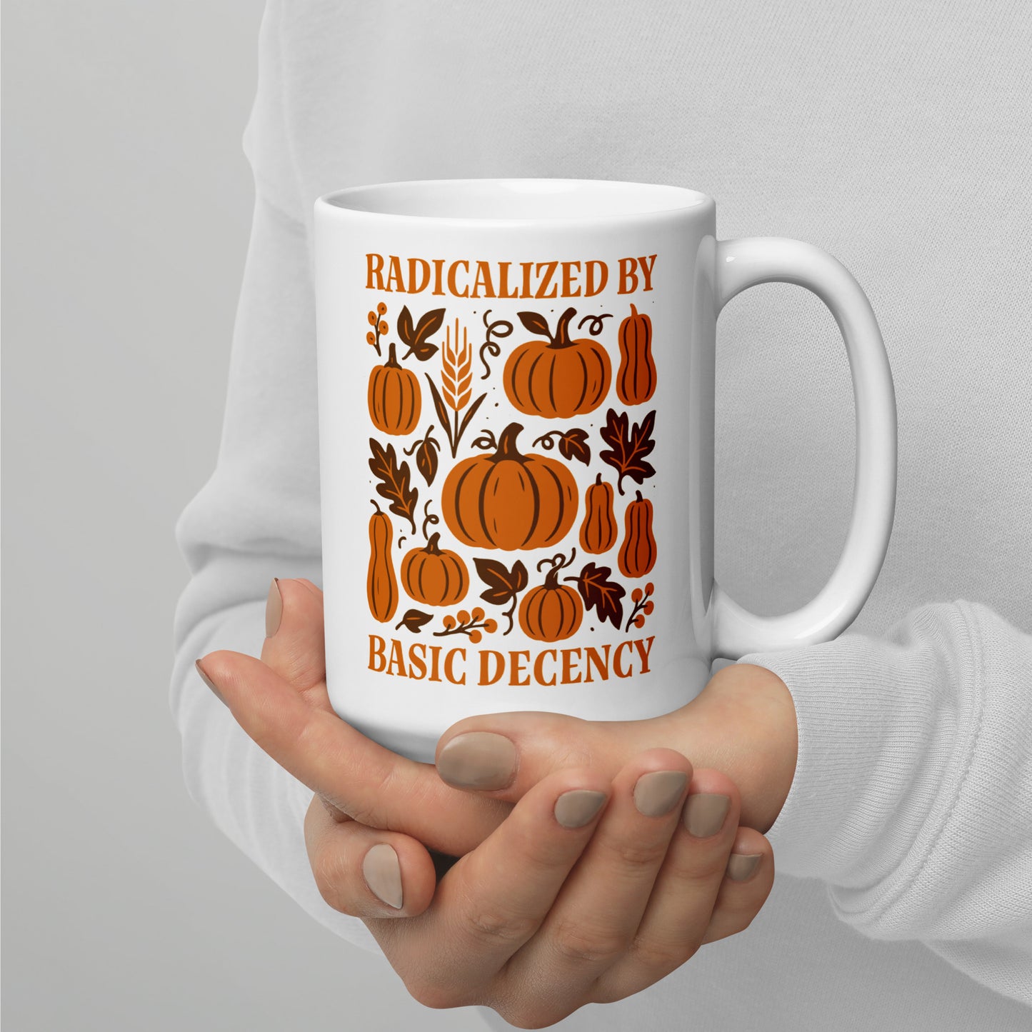 15 oz “Radicalized by Basic Decency” fall pumpkin graphic ceramic mug, Blue Wave progressive drinkware celebrating compassion and democracy.