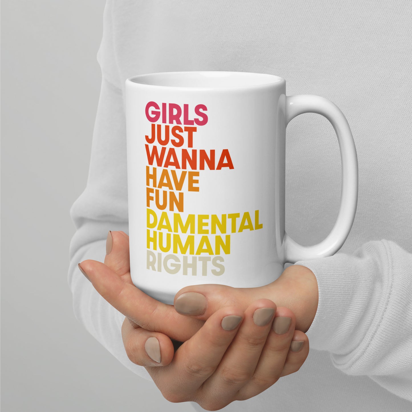 Model in white sweater holding “Girls Just Wanna Have Fundamental Human Rights” feminist mug, Blue Wave USA progressive statement gift.