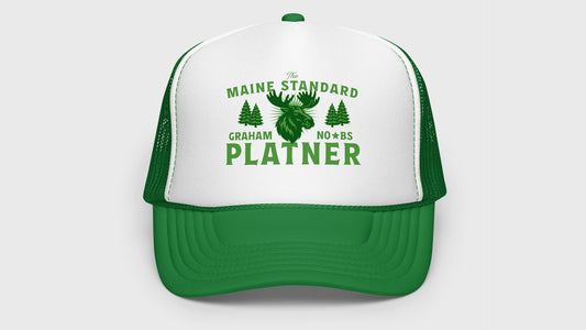 Green and white trucker hat featuring a vintage moose graphic with "Maine Standard," "Graham Platner," and "No BS" text.