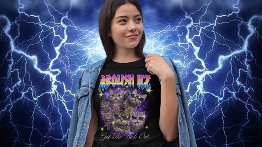 Model wearing a black Abolish ICE Bootleg Cat graphic t-shirt against a blue lightning background.
