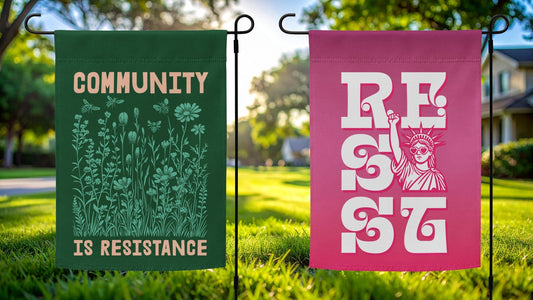 Blog header image showing two progressive political garden flags in a sunny suburban yard, including a green “Community Is Resistance” floral design and a retro pink RESIST feminist activism flag.