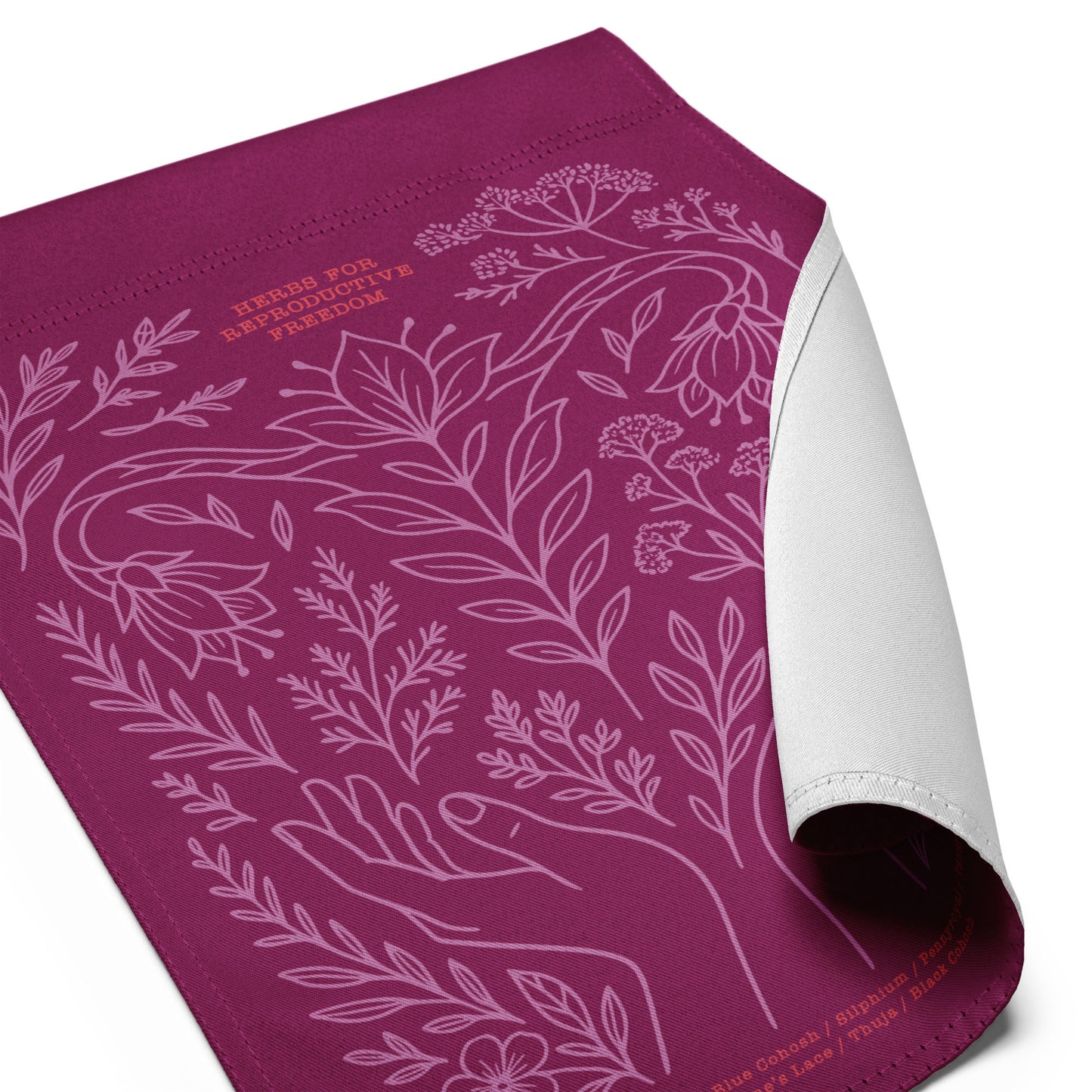 Close-up of the magenta double-sided garden flag showing lavender floral artwork, crescent moon, and delicate printed detailing.