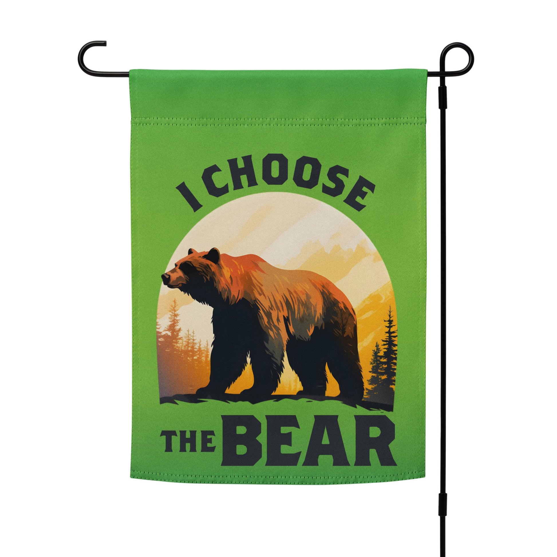 Garden flag mounted on a black metal stand, centered on a green background with a realistic bear graphic framed by trees and sunset tones reading “I CHOOSE THE BEAR,” by Blue Wave USA.