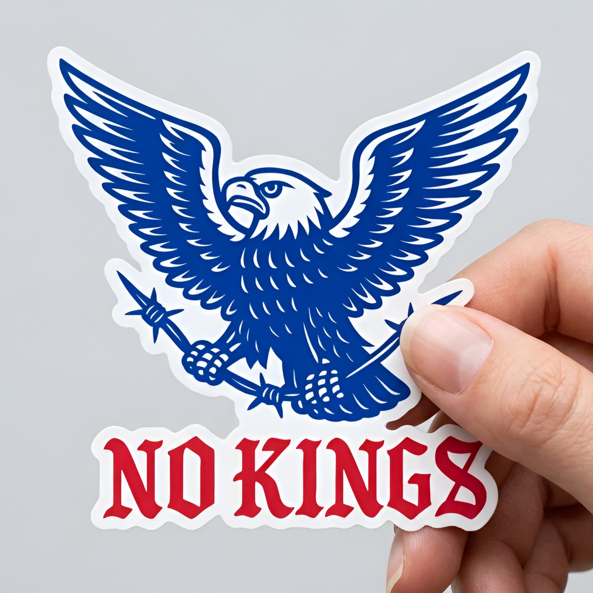 Die-cut sticker featuring a blue eagle clutching barbed wire above bold red “NO KINGS” text, patriotic anti-authoritarian protest artwork for justice-focused design.