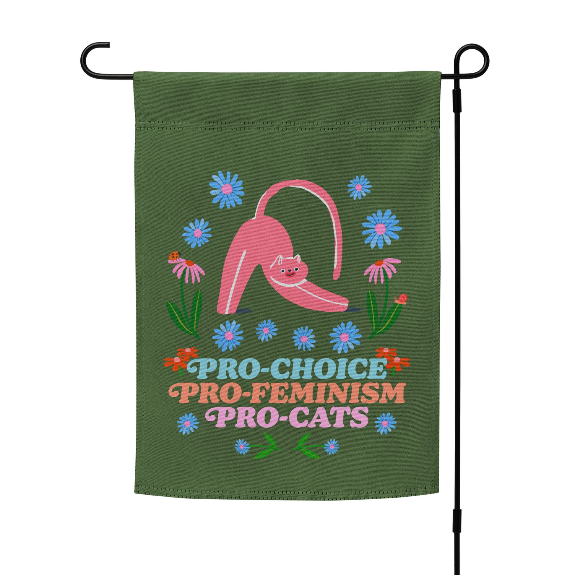 Green garden flag displayed on a black metal stand, featuring a pink cat stretching among flowers with bold retro lettering reading “PRO-CHOICE PRO-FEMINISM PRO-CATS,” by Blue Wave USA.