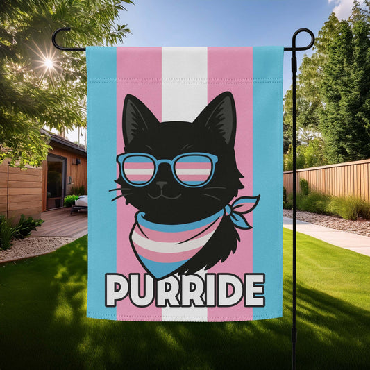 Trans Pride “Purride” garden flag featuring a black cat in sunglasses and scarf on the pink, blue, and white transgender pride stripes, displayed outdoors on a flagpole.