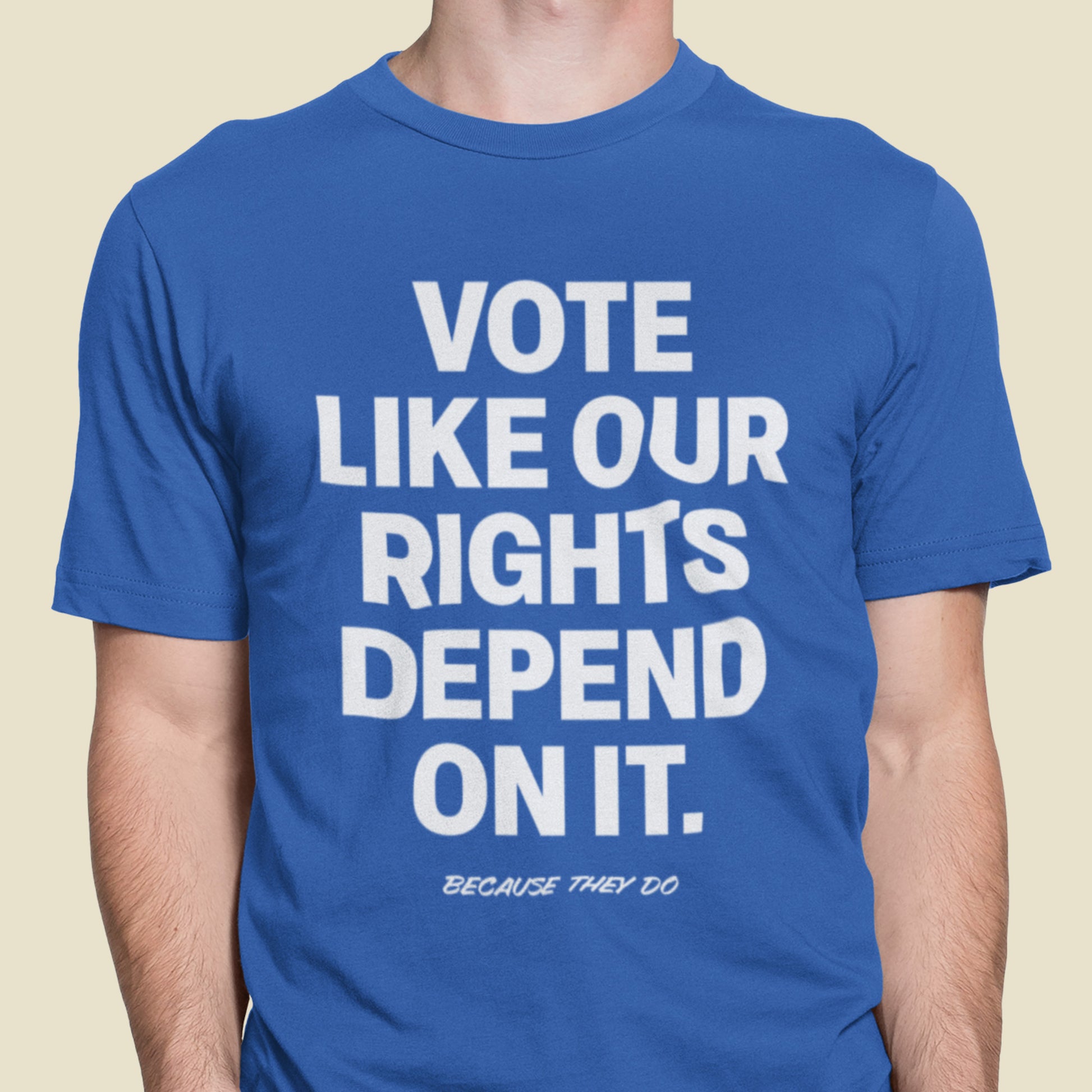 Person wearing a royal blue Vote Like Our Rights Depend On It shirt. The confident, minimalist type reflects civic pride and purpose — designed by Blue Wave USA for those who show up and speak out.