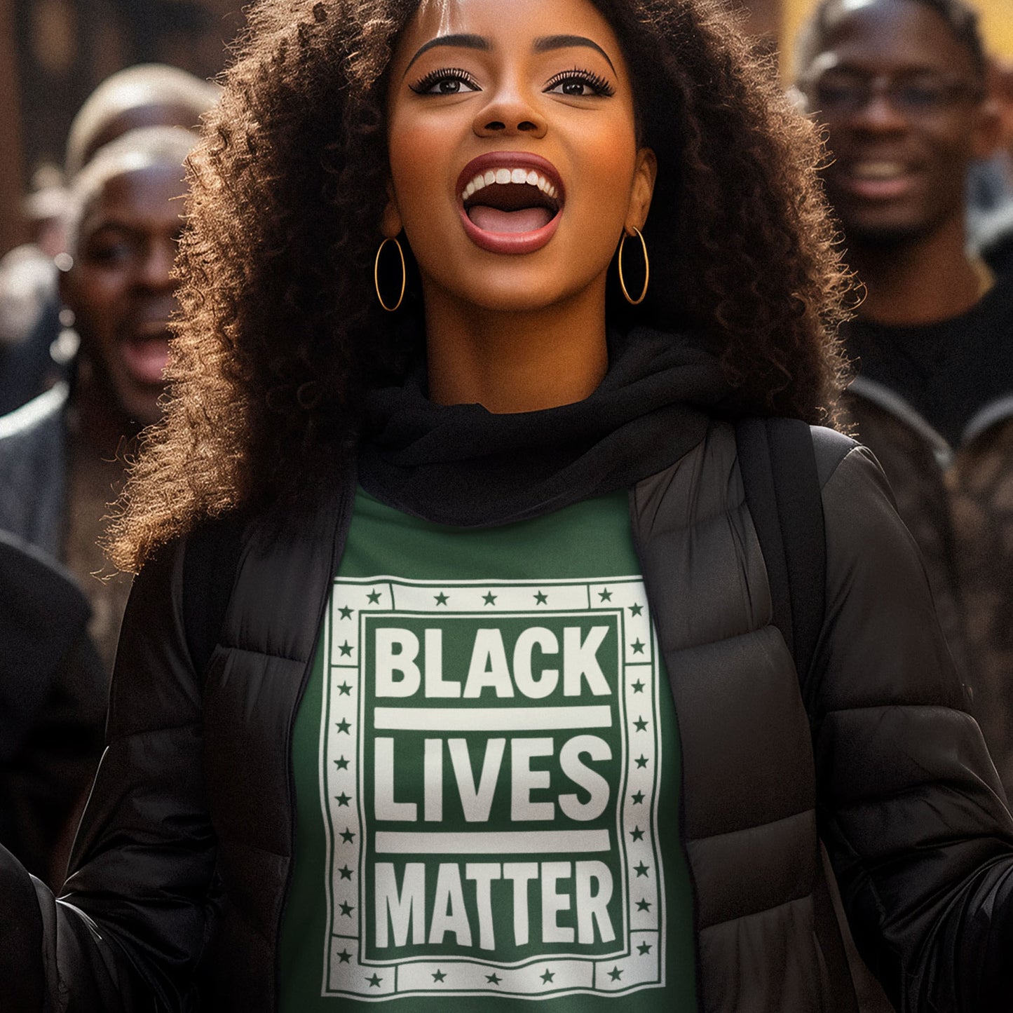 Person in a Black Lives Matter shirt surrounded by people, smiling with pride and energy. A reminder that activism is community — powered by Blue Wave USA.