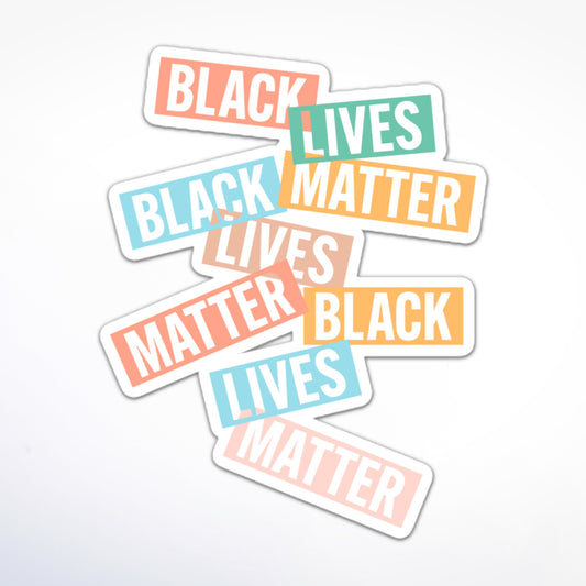 Pastel protest sticker with “Black Lives Matter” in colored boxes, promoting racial equality and justice.
