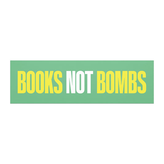 Car magnet featuring bold block lettering reading “BOOKS NOT BOMBS” in yellow and white text on a green background.